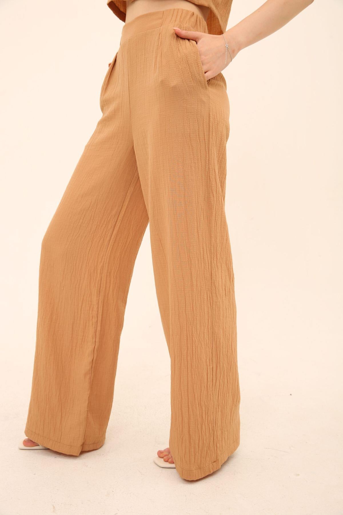 Crop düğmeli gömlek, palazzo geniş paça pantolon takım