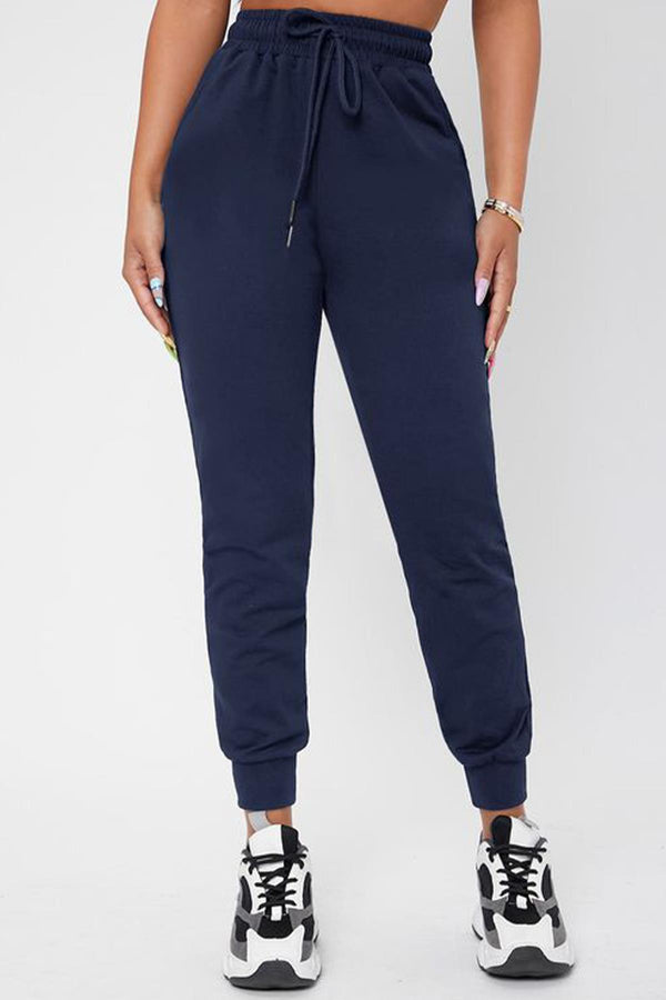 3 thread raised cotton women's sweatpants with elasticated hems and pockets