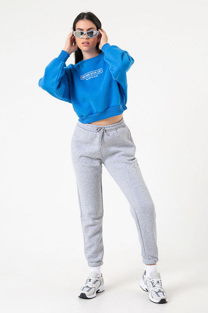 3 iplik şardonlu slogan baskılı boxy düşük omuz kadın sweatshirt