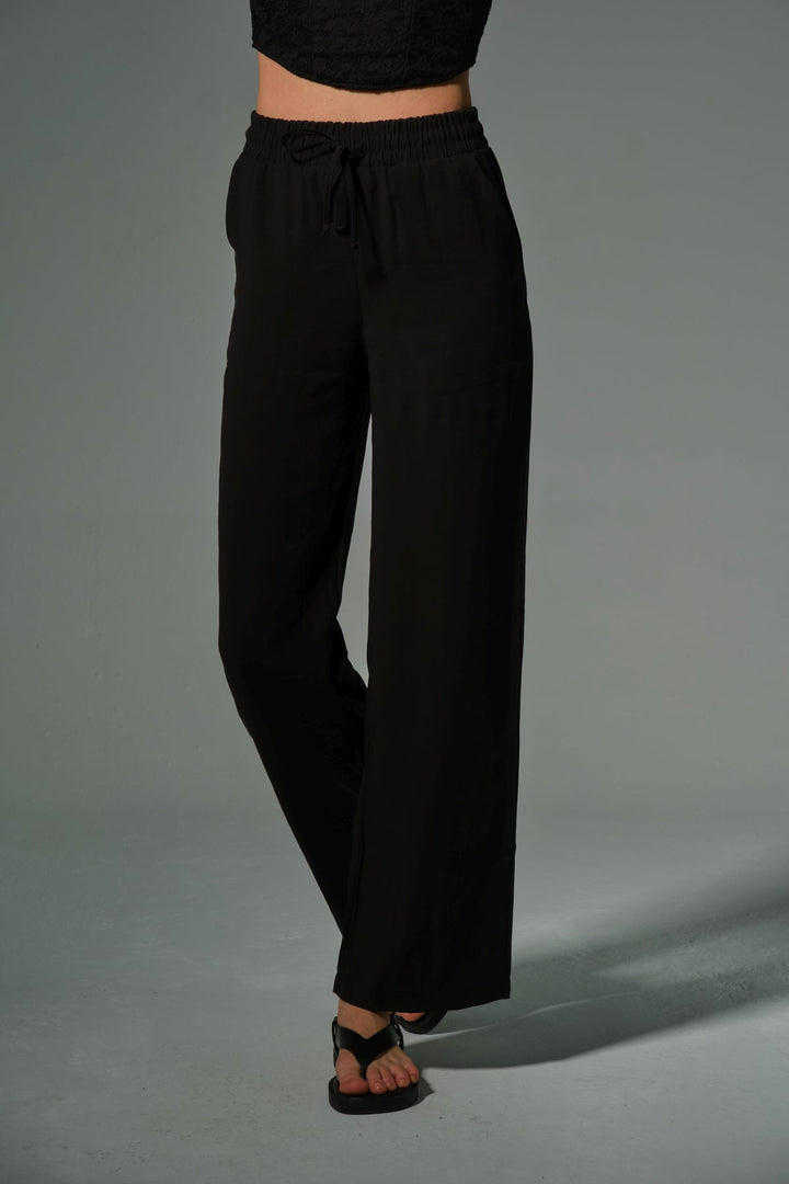 yüksek bel, yapışmaz dökümlü kumaş lastikli palazzo geniş paça kadın pantolon Domoda