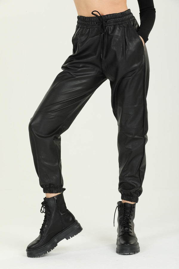 Women's Faux Leather Trousers with Elastic Waist and Leg Legs, Pockets, Joggers and Velvet Fringing inside.